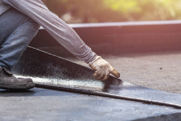 Professional Waterproofing technician working in Williamsburg, IN